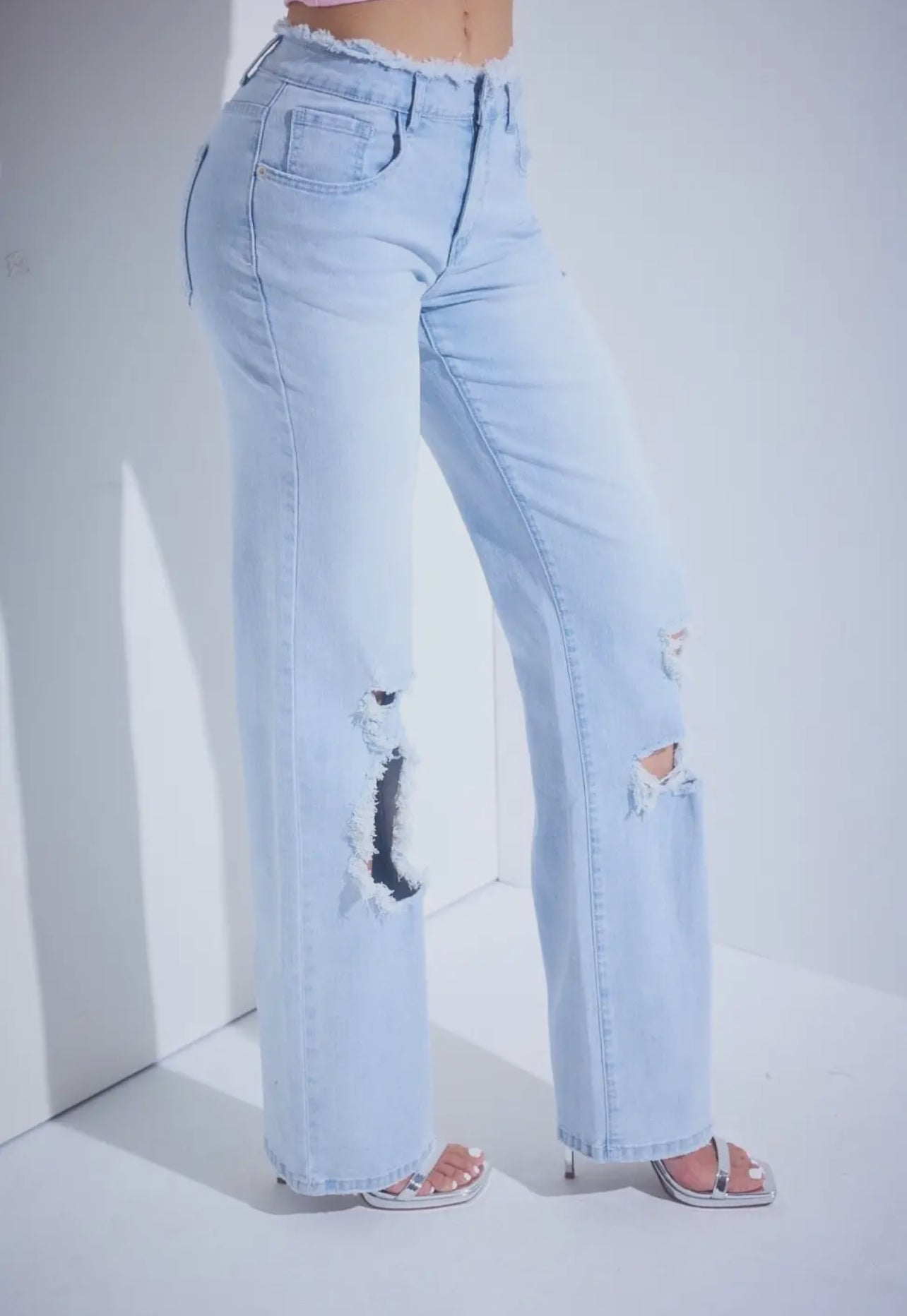 Straight Leg Distressed High Rise
Denim Jeans